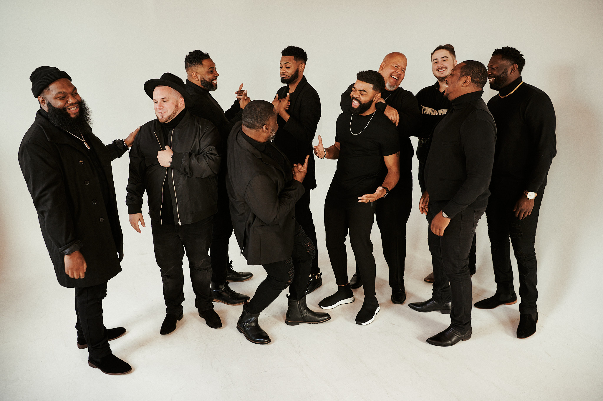 A diverse group of men sharing laughter and brotherhood