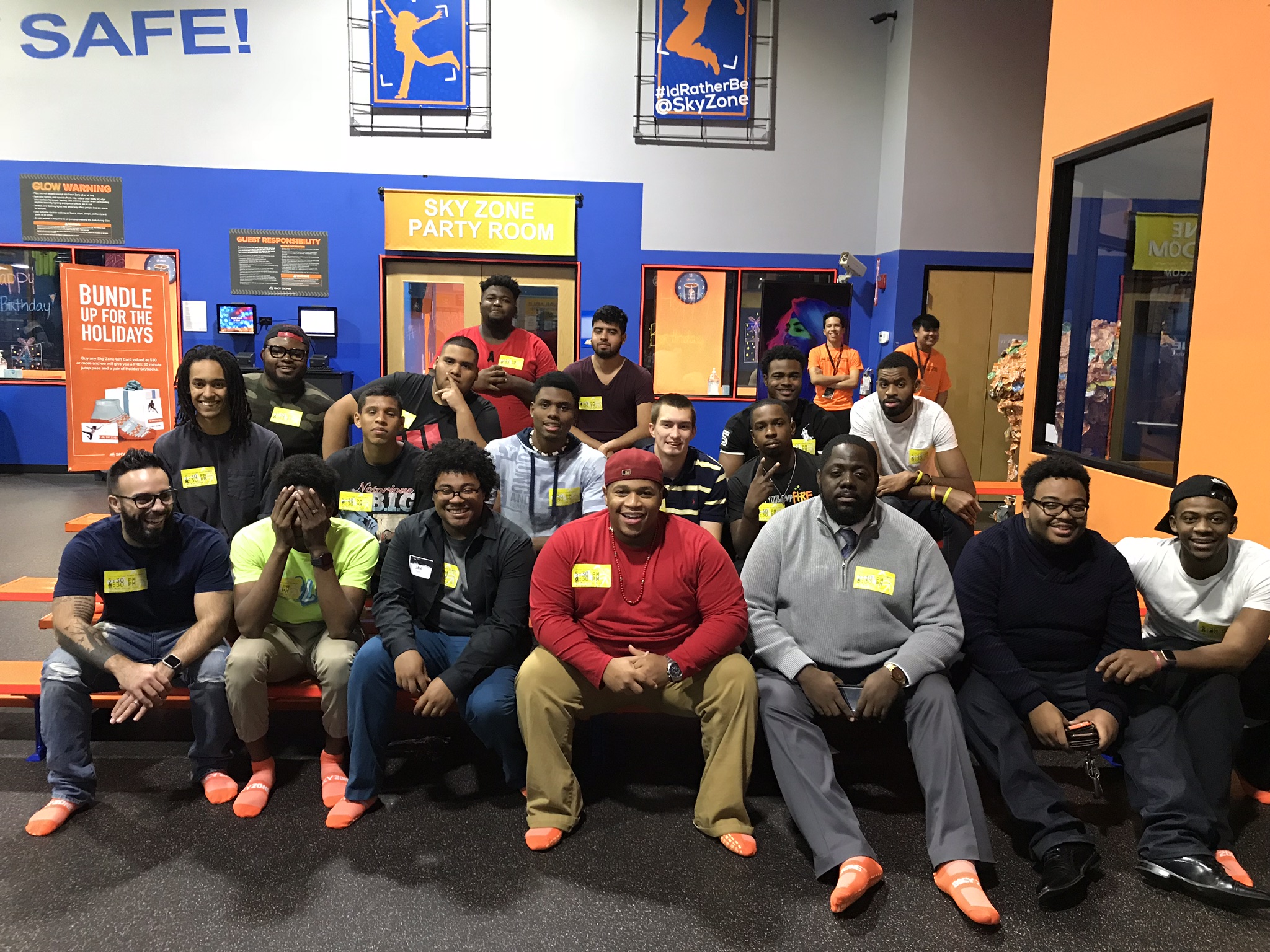 Robert with a group of young men at a mentoring event